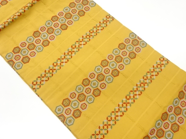 横段に亀甲・七宝模様織出し名古屋帯